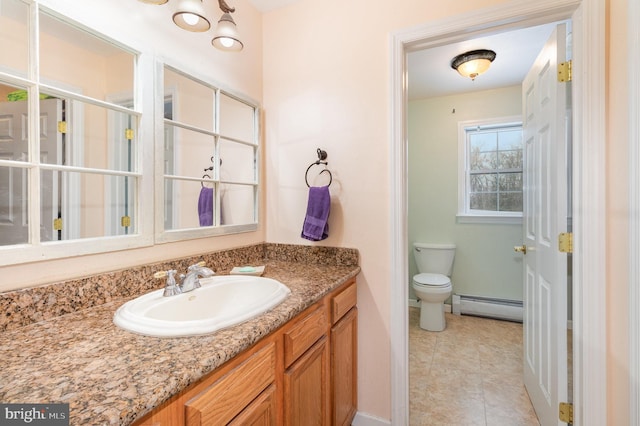 4229 Roundtop Rd, Elizabethtown, PA 17022 - bathroom with a baseboard radiator, vanity, and tile patterned flooring