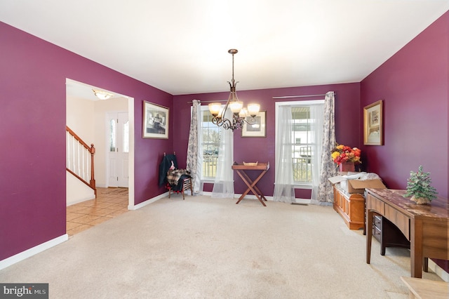4229 Roundtop Rd, Elizabethtown, PA 17022 - dining space featuring healthy amount of natural light, stairway, a chandelier, and light colored carpet