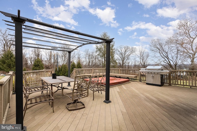 wooden terrace with a pergola and area for grilling