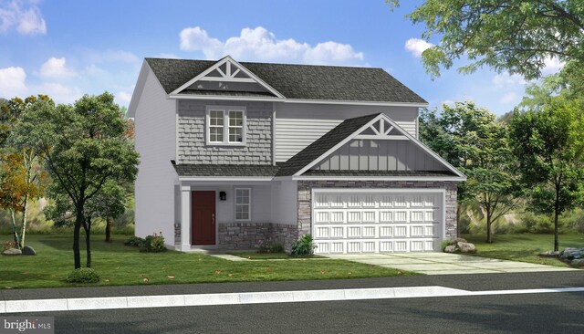 craftsman-style house featuring a front yard and a garage