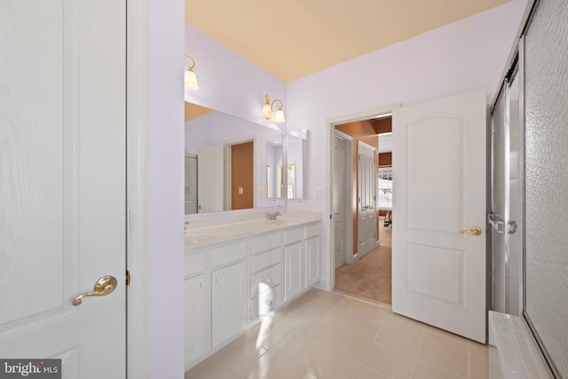 bathroom with vanity and tile patterned floors