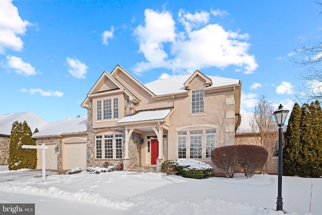 view of front of home with a garage