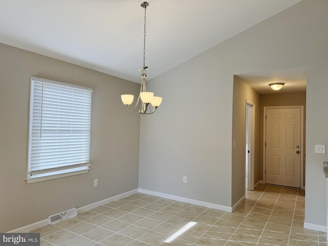 unfurnished room with a notable chandelier and lofted ceiling