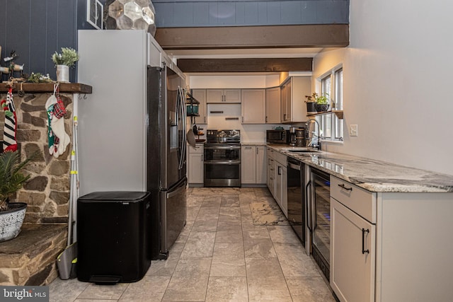 kitchen featuring sink, wine cooler, light stone countertops, beam ceiling, and stainless steel appliances