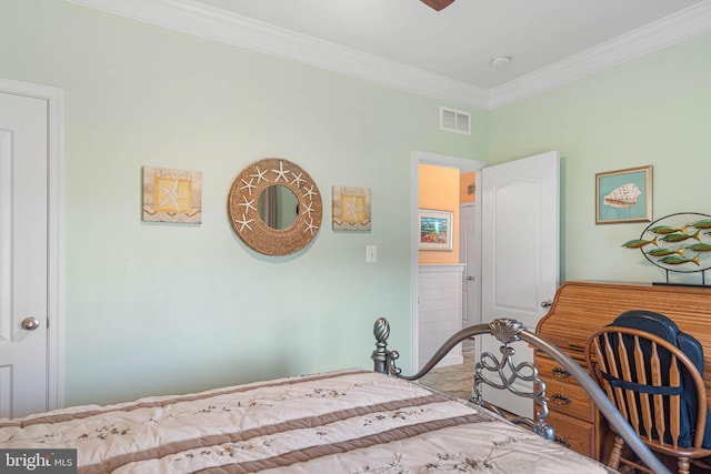 bedroom with crown molding