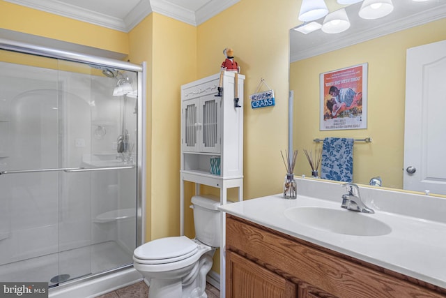 bathroom with tile patterned floors, an enclosed shower, vanity, crown molding, and toilet