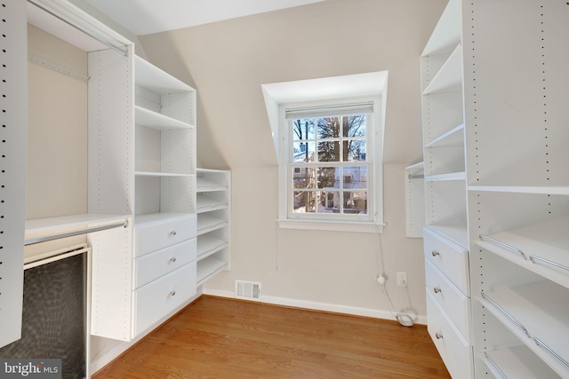 spacious closet with light wood-type flooring