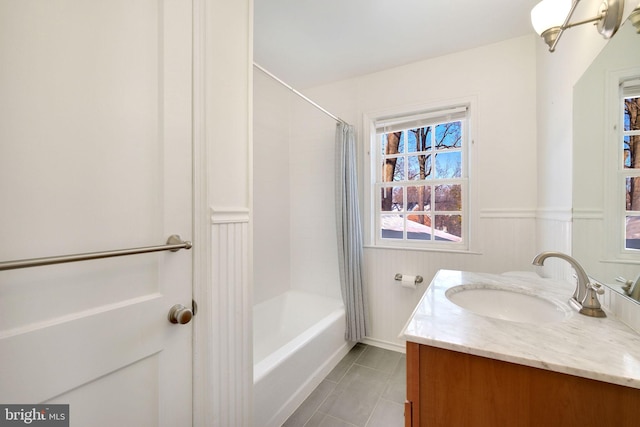 bathroom featuring vanity, tile patterned floors, and shower / bathtub combination with curtain