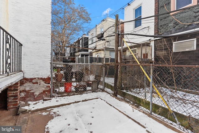 view of snow covered patio