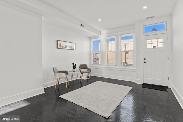 entrance foyer with dark parquet floors