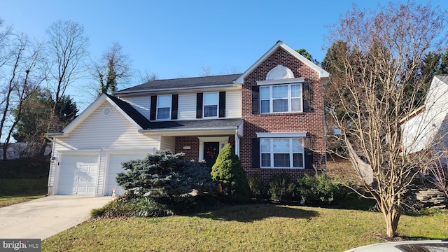 view of front property with a front yard and a garage