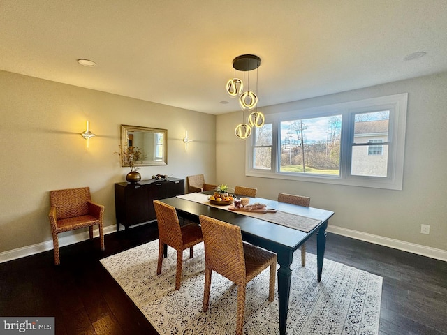 dining room featuring dark wood-type flooring