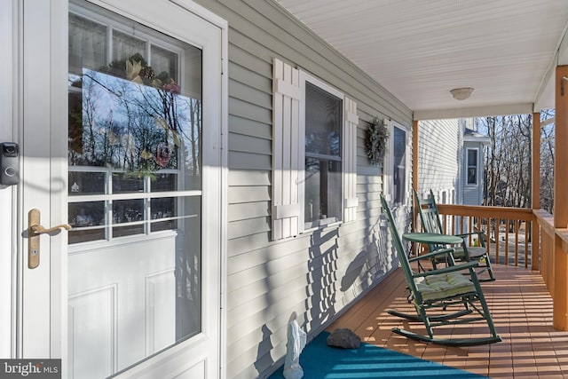 deck featuring covered porch