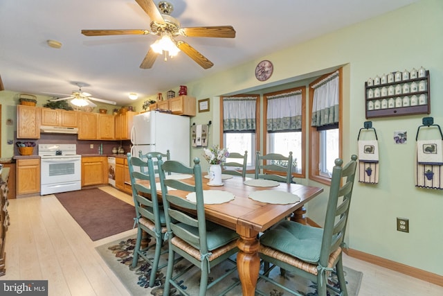 dining space featuring light hardwood / wood-style floors