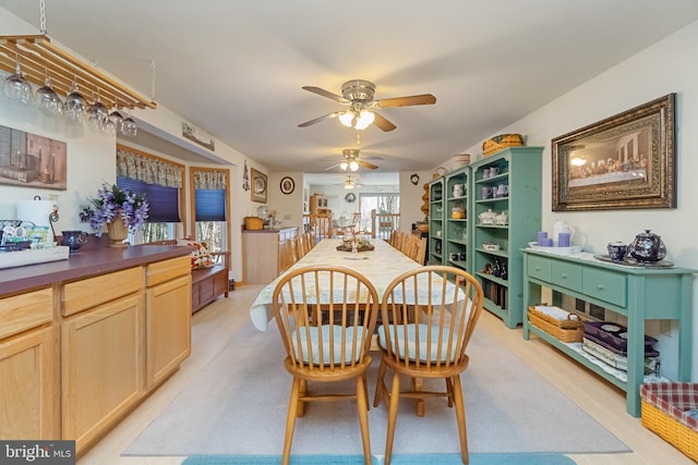 dining area featuring ceiling fan and light hardwood / wood-style flooring