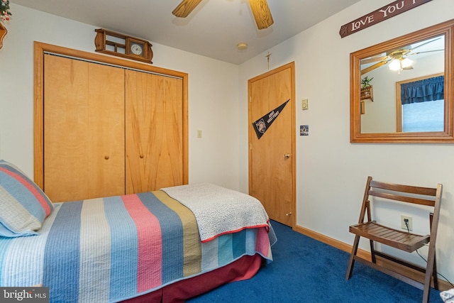 carpeted bedroom featuring ceiling fan and a closet