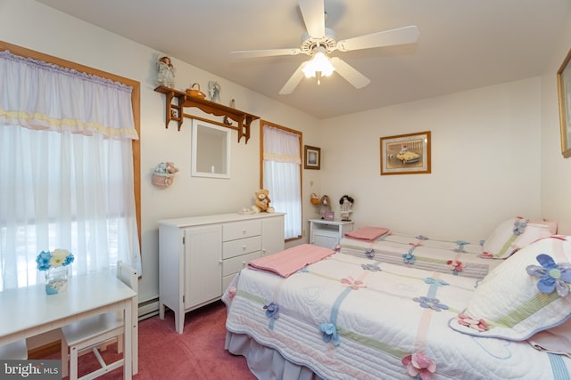 bedroom with ceiling fan, carpet floors, and a baseboard radiator