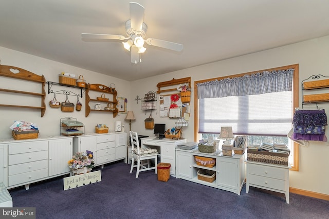 carpeted home office with ceiling fan