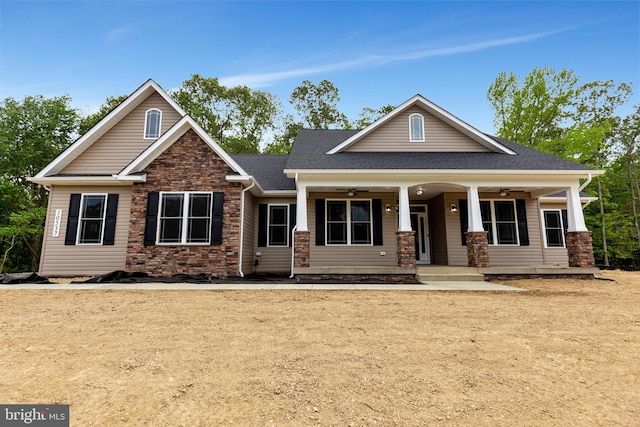 craftsman-style home with a porch and ceiling fan