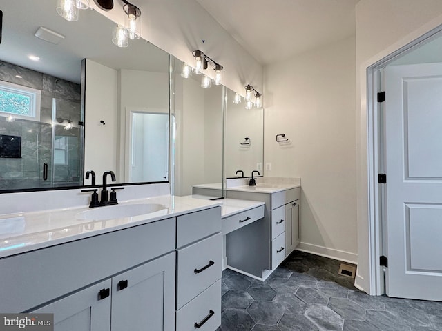4035 Tamaron Ct, Brandywine, MD 20613 - full bathroom featuring two vanities, a stall shower, and baseboards