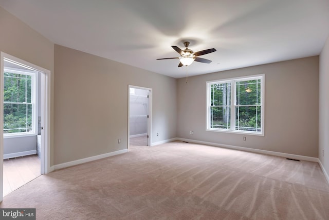 4035 Tamaron Ct, Brandywine, MD 20613 - spare room with ceiling fan, light carpet, and baseboards