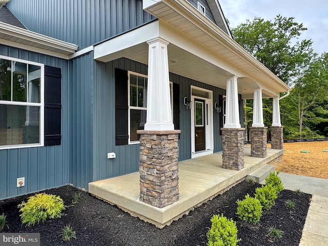 4035 Tamaron Ct, Brandywine, MD 20613 - doorway to property with covered porch and board and batten siding