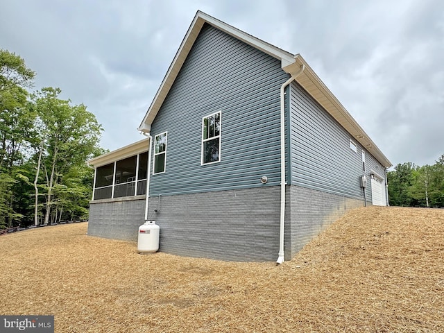 4035 Tamaron Ct, Brandywine, MD 20613 - view of home's exterior featuring a sunroom and a garage