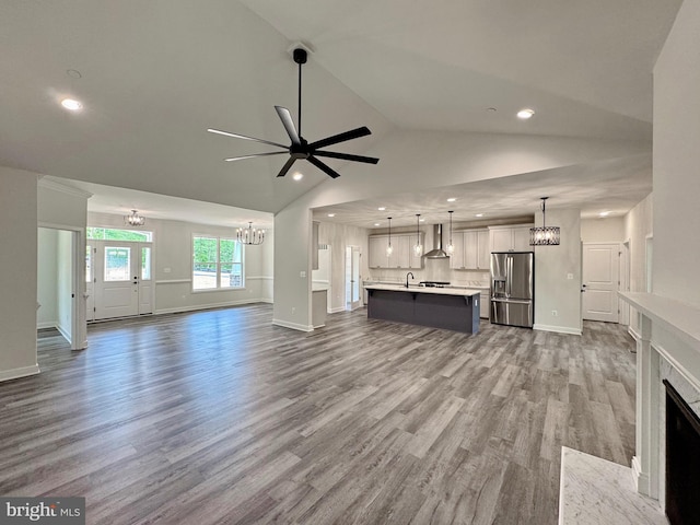 4035 Tamaron Ct, Brandywine, MD 20613 - unfurnished living room featuring a chandelier, recessed lighting, baseboards, a ceiling fan, and a fireplace with flush hearth