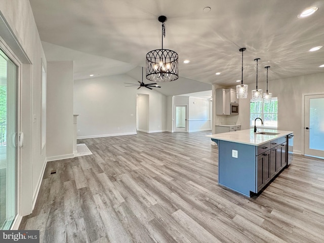 4035 Tamaron Ct, Brandywine, MD 20613 - kitchen with a sink, a chandelier, recessed lighting, light wood-style floors, and a center island with sink