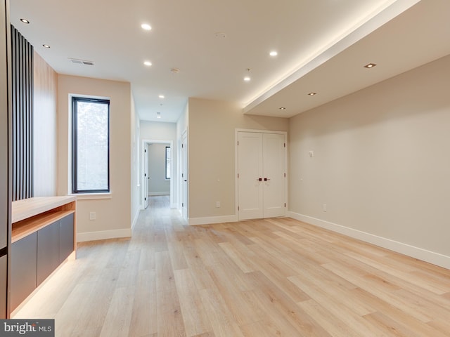 empty room with light wood-type flooring