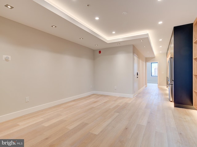 unfurnished room featuring light wood-type flooring