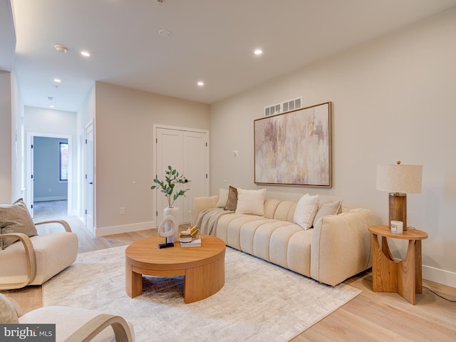 living room featuring light wood-type flooring