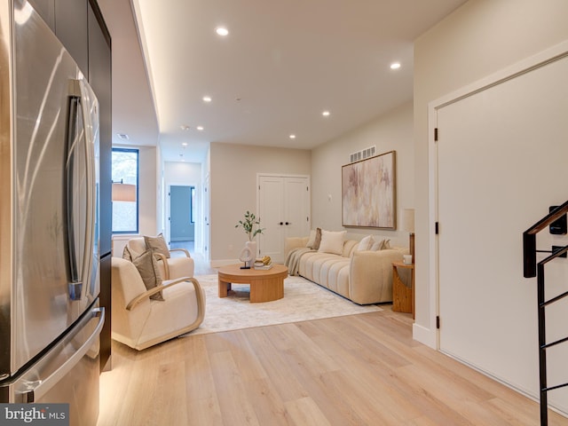 living room featuring light wood-type flooring