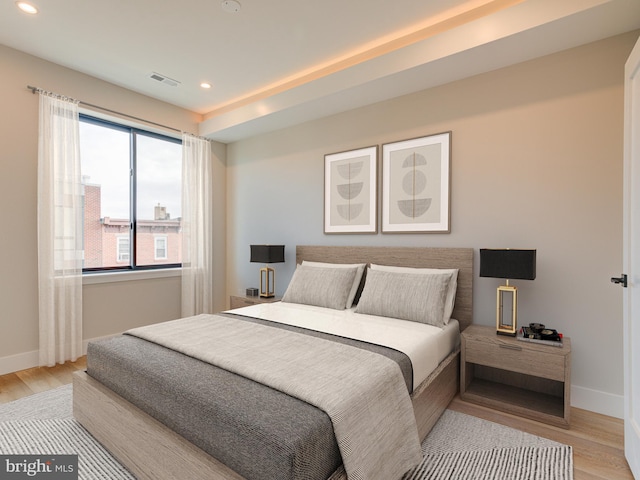 bedroom with light wood-type flooring