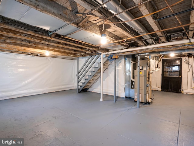 basement featuring heating unit