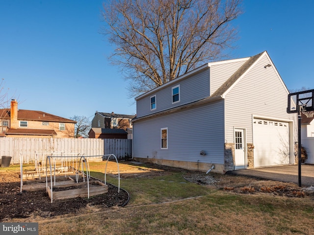 back of property featuring a yard