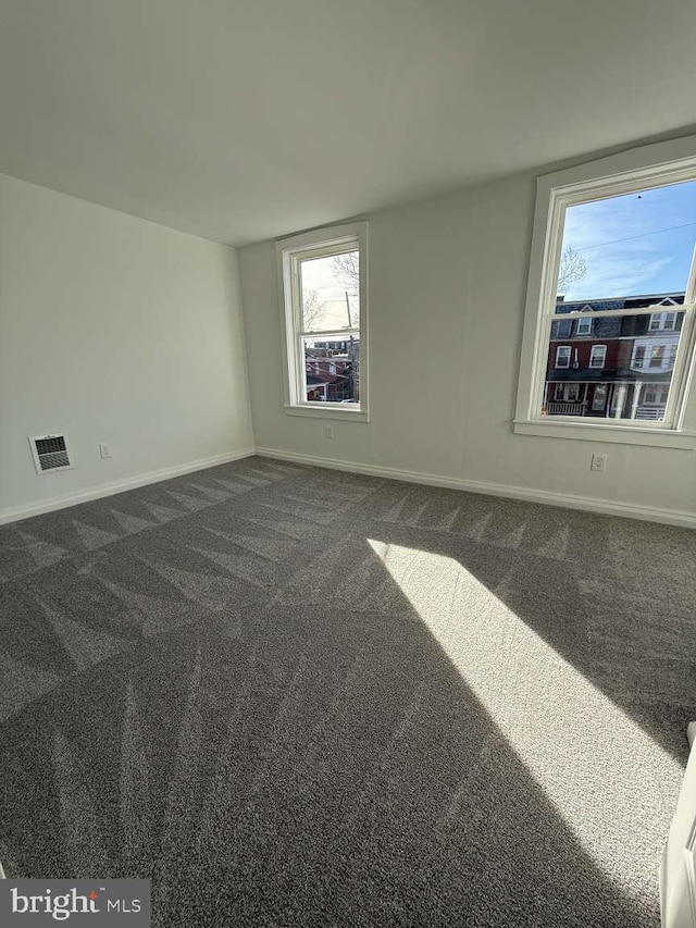 view of carpeted spare room