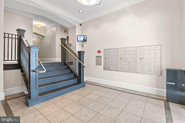 staircase with tile patterned flooring, crown molding, and mail boxes