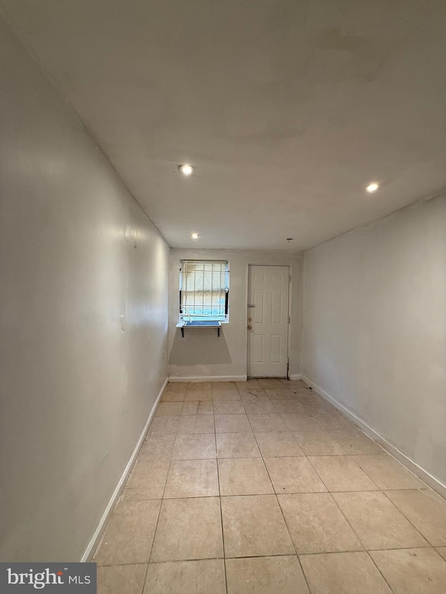 interior space with light tile patterned floors