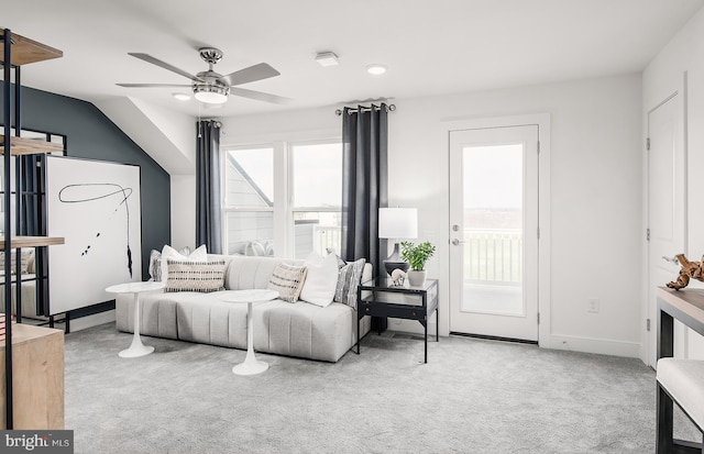 carpeted bedroom featuring ceiling fan, access to outside, and vaulted ceiling