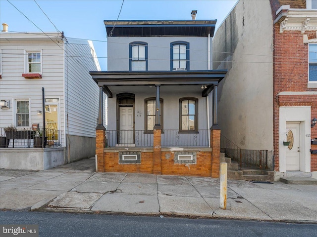 multi unit property featuring a wall mounted air conditioner