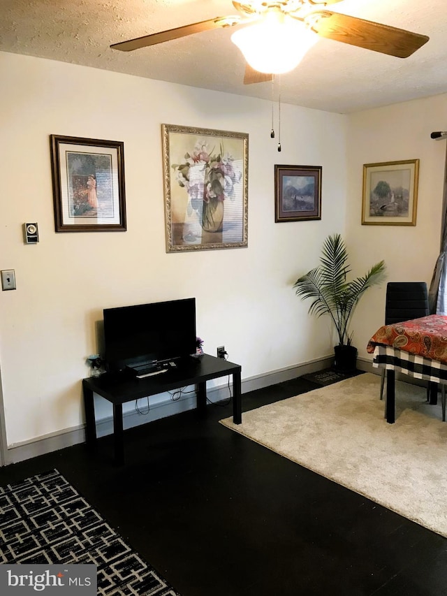 interior space featuring a textured ceiling and carpet floors