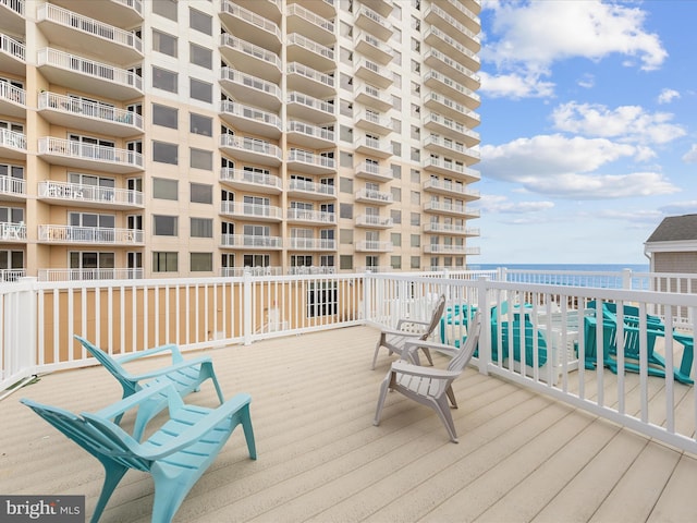 deck featuring a water view