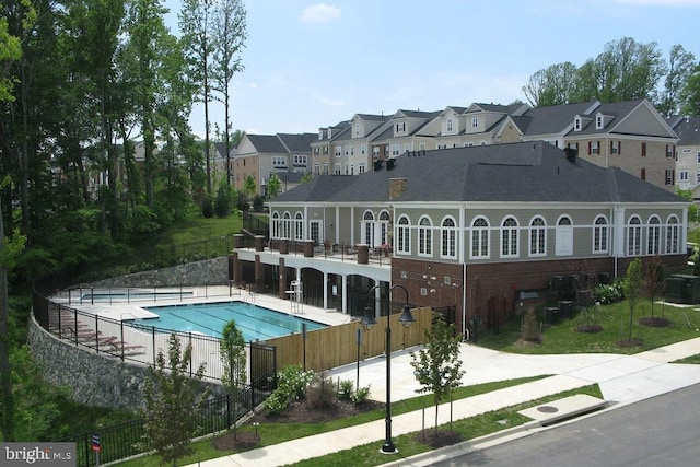 view of pool with cooling unit