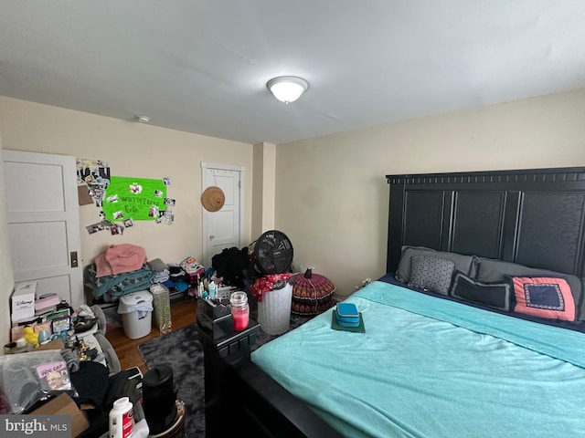 bedroom featuring wood-type flooring