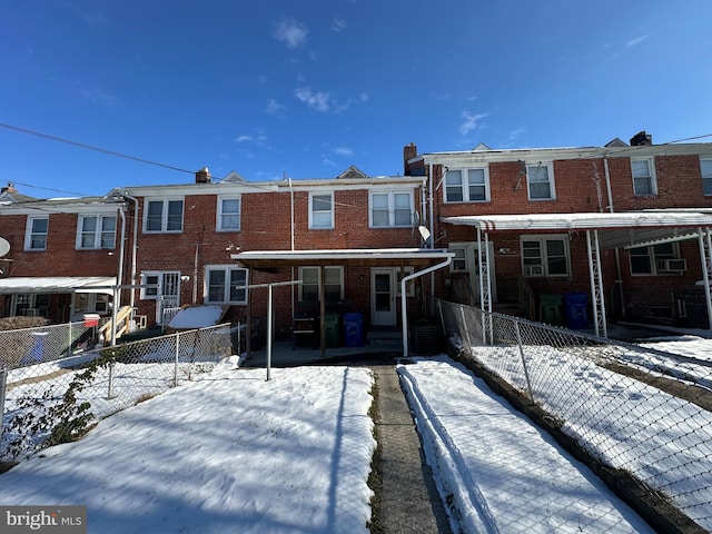 view of snow covered property