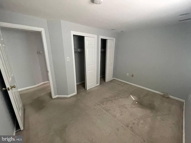 unfurnished bedroom featuring carpet