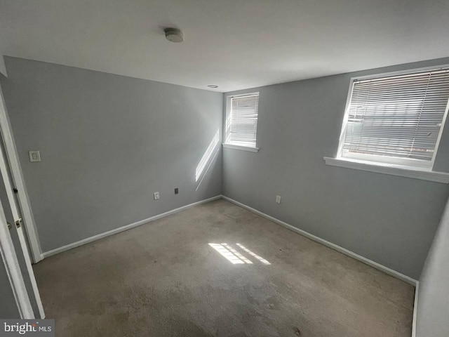 empty room featuring carpet floors