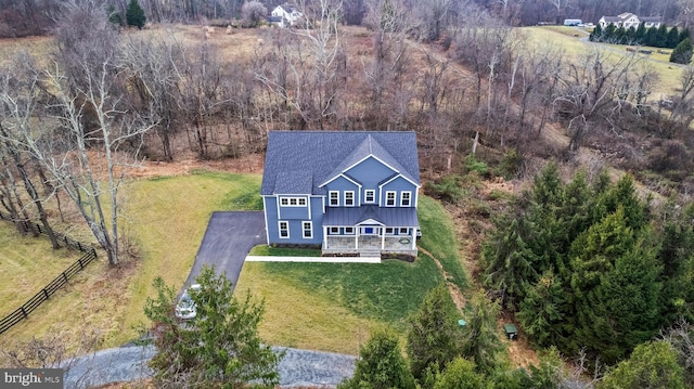 birds eye view of property featuring a rural view