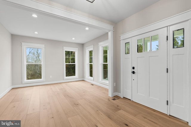 foyer entrance featuring light wood-type flooring